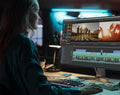 Person editing video on a computer 